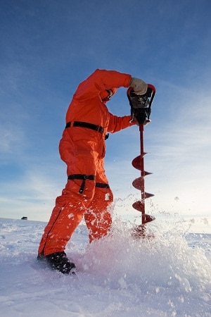 auger cutting through ice