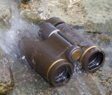 waterproof binocular in a waterfall