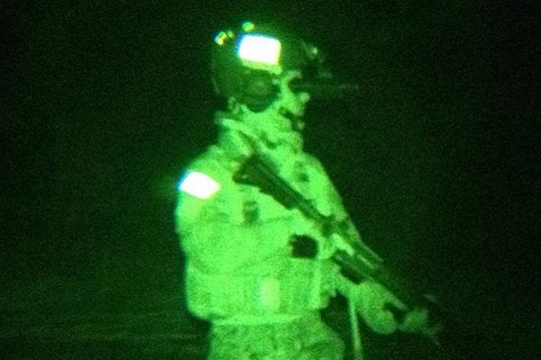 soldier standing in night vision