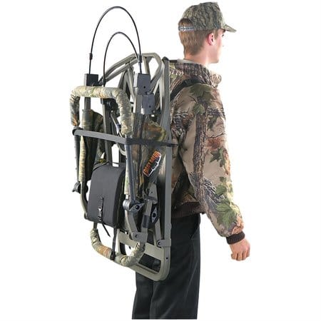 Hunter carrying a climbing tree stand
