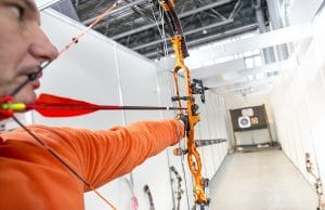 archer shooting a compound bow