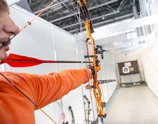 archer shooting a compound bow