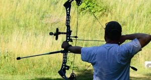archer with compound bow