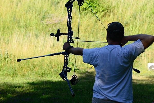 archer with compound bow