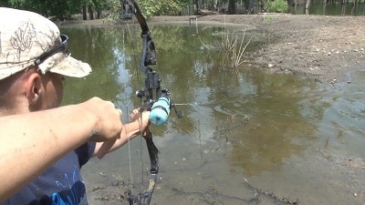 Bowfishing in river