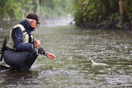 fishing under the rain