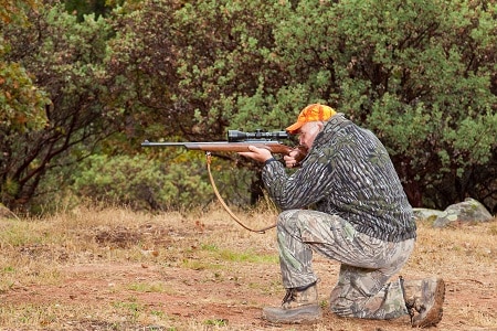 Hunter Aiming in a Kneeling Position