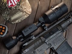 Night vision scope mounted on rifle