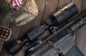 Night vision scope mounted on rifle