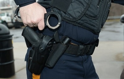 police officer wearing gun belt