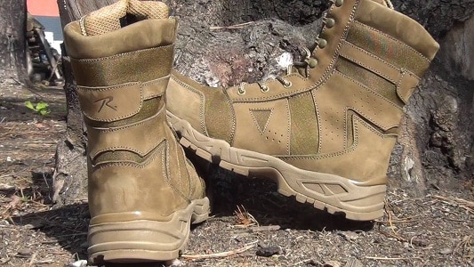 Rothco tactical boots by a tree