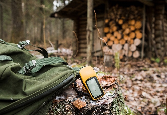 a hunting gps along with bag