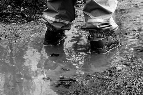 boots in puddle of water