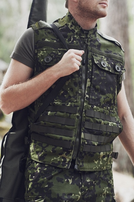 hunter wearing concealed carry vest