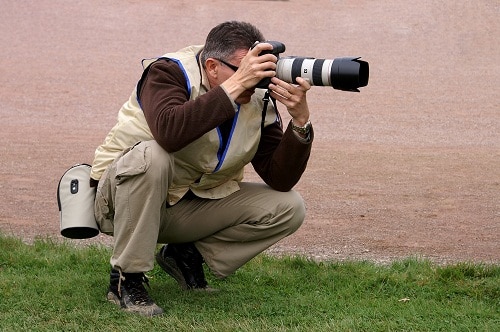 Photographer wearing concealed vest