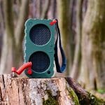 Portable radio on log