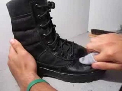 wiping boot with wet cloth