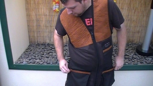 man wearing shooting vest