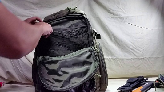 unzpping tactical backpack