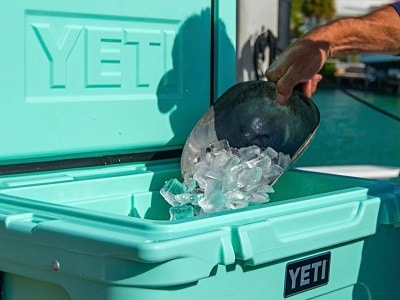 cooler being filled with ice