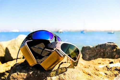 polarized glasses by the shore