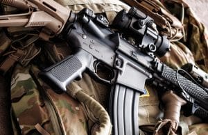 M4A1 (AR-15) tactical carbine on the bulletproof vest