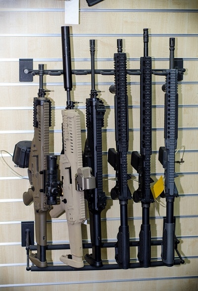 gun wall rack with rifles