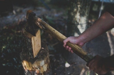 Man chopping wood with axe