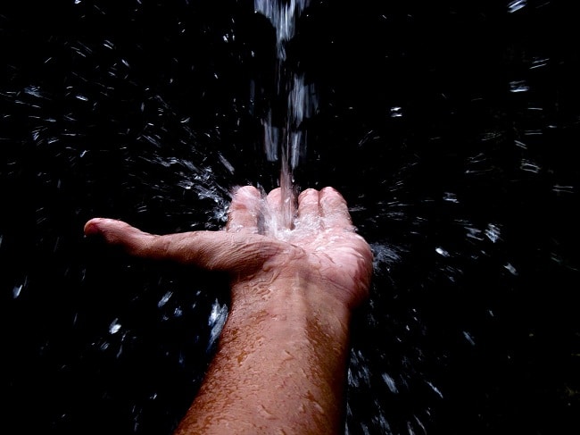 water dripping on hand