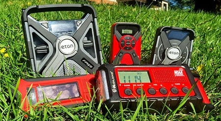 different emergency radios on the grass