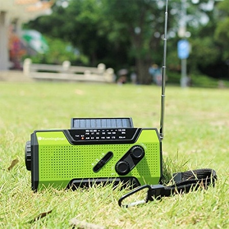 emergency radio charging with solar panel on the ground