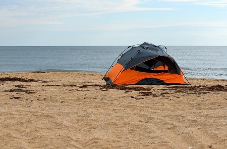 crooked tent on the seashore