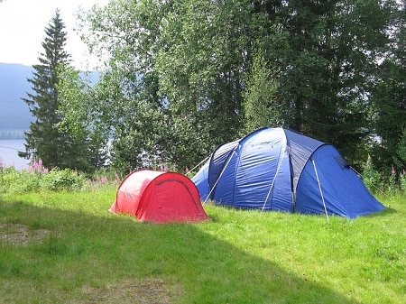 regular and family tent on camping area