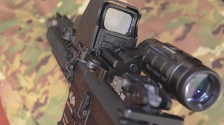UTG flip up scope mounted on rifle upclose