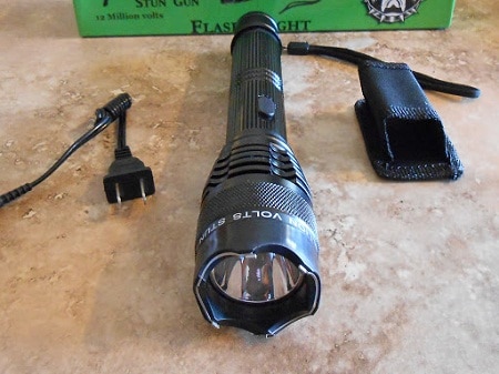 flashlight stun gun with holster and charger