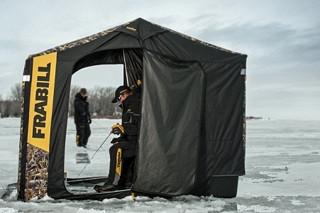 anglers in Frabill tent on frozen lake