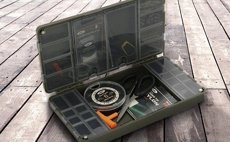 various fishing gear in tackle box