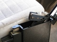 gun safe with pistol by car driver seat