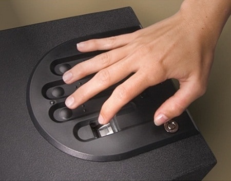 hand opening a biometric gun safe