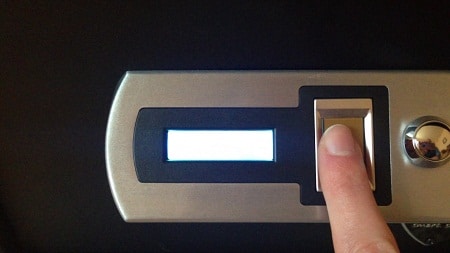 index finger opening a biometric lock
