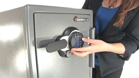 lady opening SentrySafe using keypad