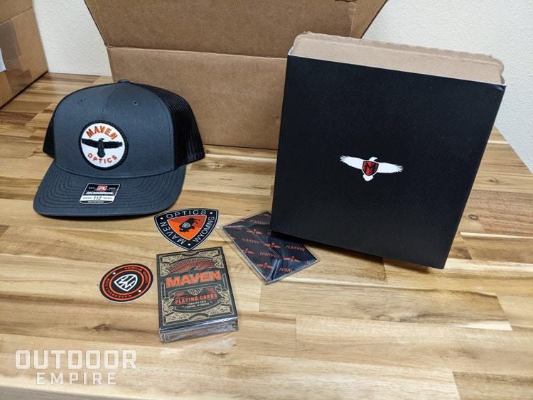 Maven hat, cards, and box on a desk