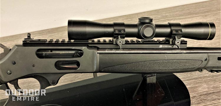 Side view of scope mounted on lever action rifle with XS sights rail