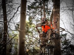 aiming rifle from x stand the duke treestand