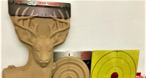 Birchwood Casey 3D deer target and other targets on a table