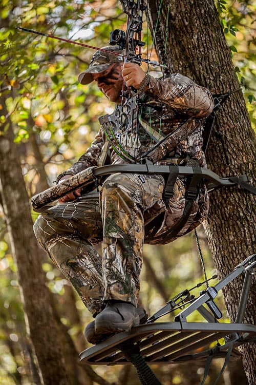 Hunter sitting comfortably in a treestand