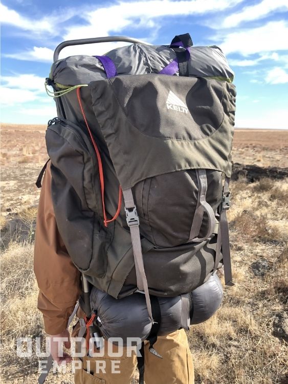 hiker's back view with a Kelty Tioga