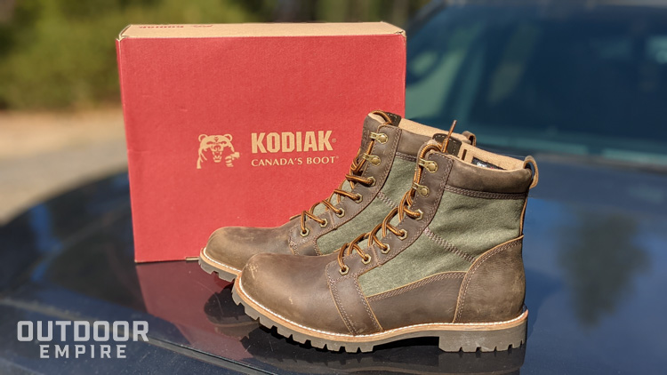 New Kodiak Boots sitting on hood of truck next to shoebox