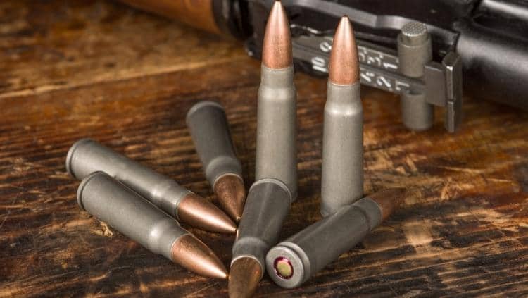 Rifle cartridges caliber 7.62 x 39 mm on wood