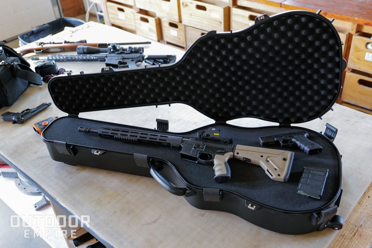 Savior Equipment guitar case with AR15 and pistol inside